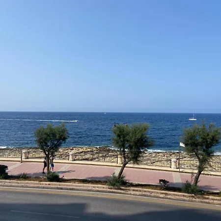 The Seafront Escape Слима